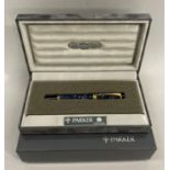 A Parker Duofold fountain pen with blue marbled case and 18K gold nib, in original box with