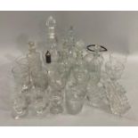 Quantity of glassware including two triple collar decanters engraved with grapevine and various