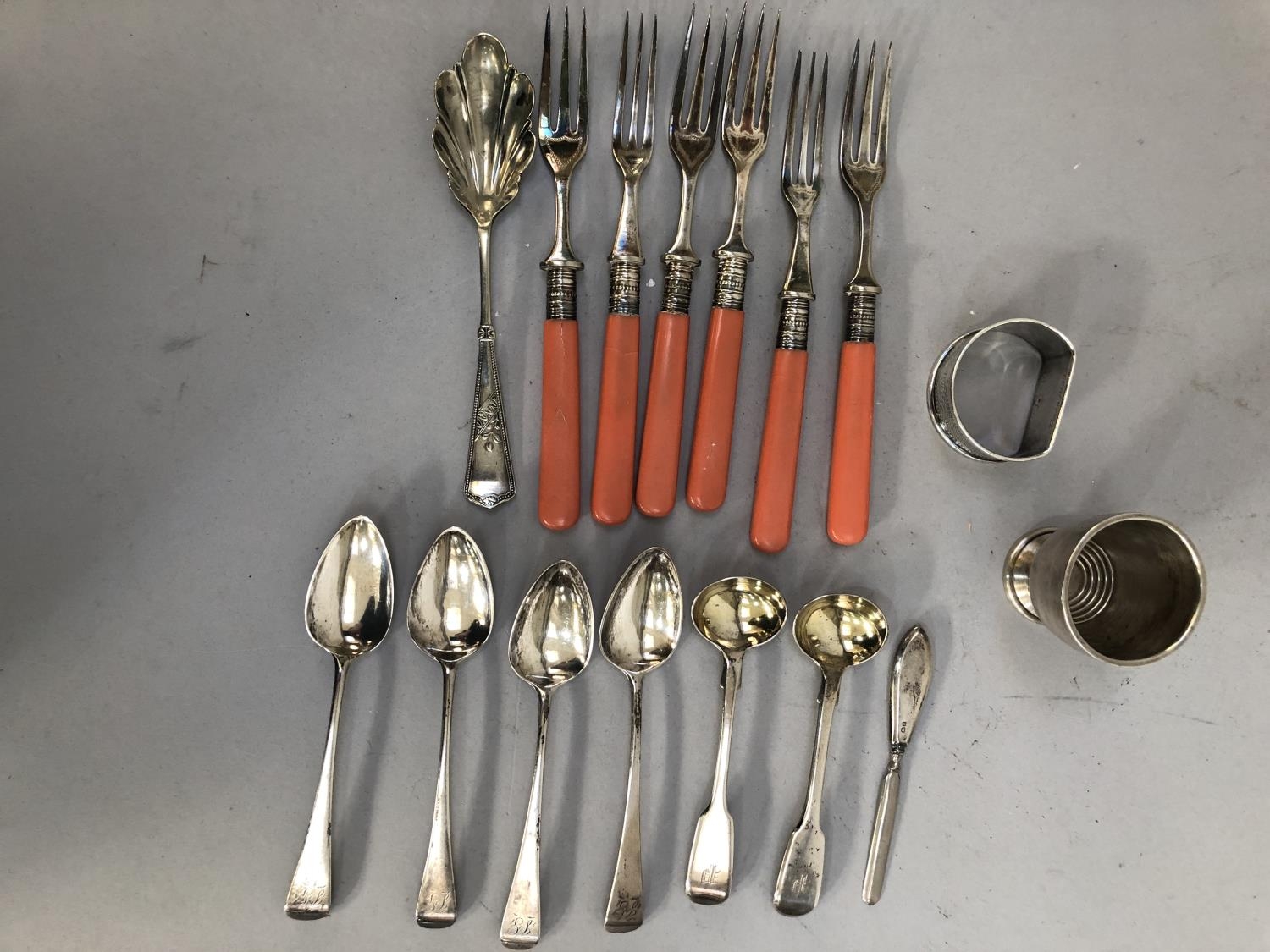 A collection of late 18th century and early 19th century silver tea and salt spoons, all with