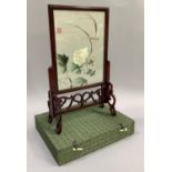 A Chinese embroidered panel of white rose and foliage with ornate carved stand in original box