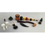 Vegetable ivory Stanhope, three carved horn scent bottles, tortoise shell caddy spoon, quantity of