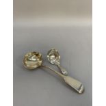 A Victorian silver sauce ladle by John Stone of Exeter Hallmarked 1859 together witha George III