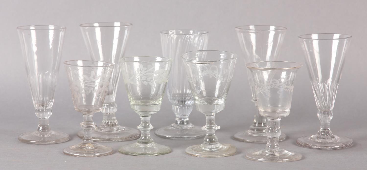 Five early 19th century cordial glasses, four with trumpet bowls on a basal knop stem and circular