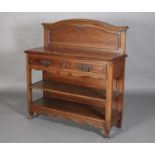 AN EARLY 20TH CENTURY FRENCH PROVINCIAL CHESTNUT BUFFET having a raised moulded back, rouge marble