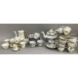 A 19th century Rockingham style tea set comprising eleven tea cups, eleven saucers, eleven side