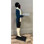 A dumb waiter modelled as man with tray