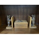 A pair of Black Forest carved standing bear bookends together with a box carved with a bear skiing