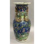 Canton famille rose vase with overhanging scalloped rim on blue ground, decorated with rural scene