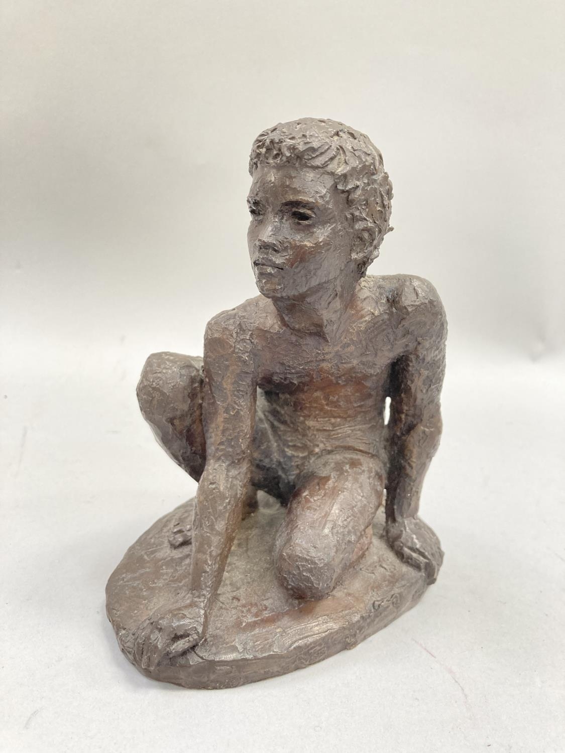 Two bronze effect resin figures of a young girl reclining and a young boy crouched on one knee, 15cm - Image 3 of 3