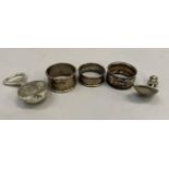 Two silver napkin rings, total approximate weight 25g together with two silver plated novelty