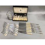 A set of mother-of-pearl handled and EPNS dessert knives and forks, a canteen of Elkington silver