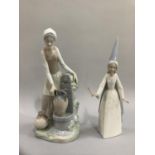 Two Lladro figures, woman by well 30cm high and fairy with wand