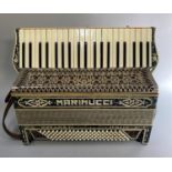 Italian piano accordion with embossed leather strap in original case