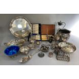 A quantity of silver plated ware including a circular tray, two-handled pedestal dish, sugar and