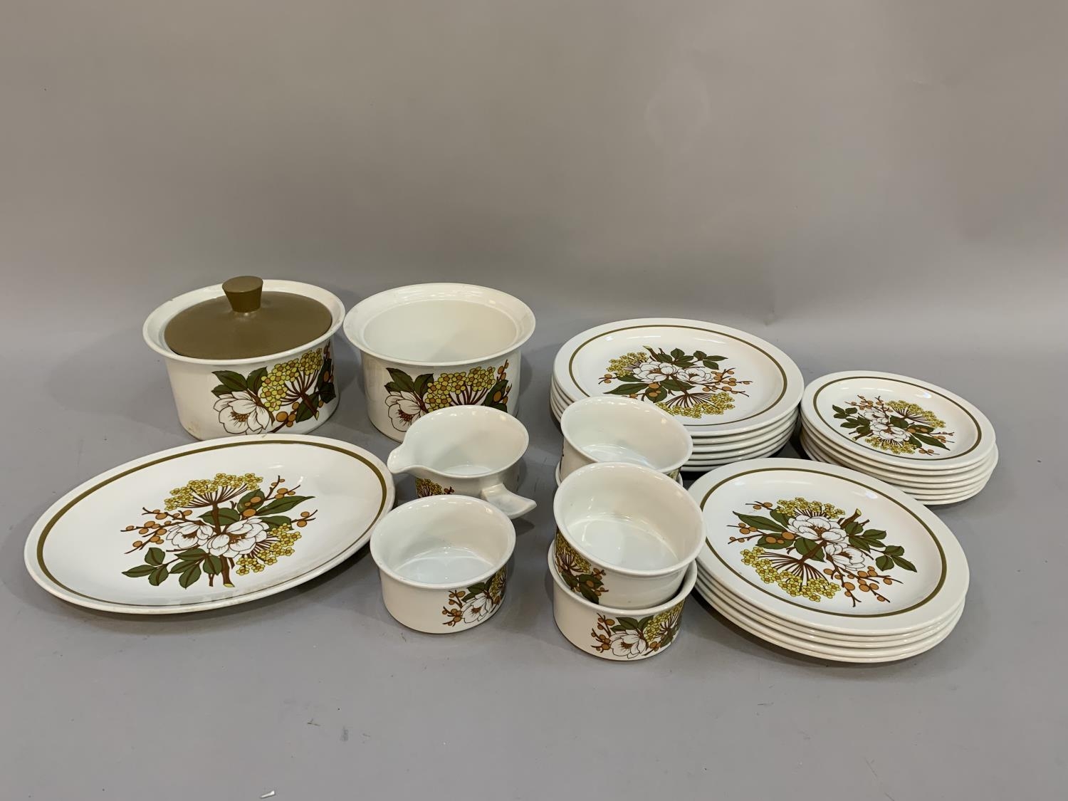 A 1970s Mid Winter dinner service of Meadow Sweet design comprising six dinner plates 26cm, five