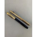 An Eversharp fountain pen and a Conklin fountain pen both with 14k gold nibs