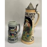 A large German pottery stein moulded in low relief with courting couple, another with views of