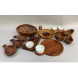 A quantity of Danish and English teak tableware including fruit bowl, ladles, bowls, platters and