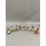 A quantity of eight Beswick Beatrix Potter figures to include Peter Rabbit, Mrs Tiggywinkle,