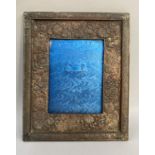 An early 20th century Meiji period Japanese photograph frame, plated on copper, embossed with