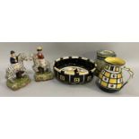 A deco style black and yellow jug and bowl set, a pair of reproduction Staffordshire style figures