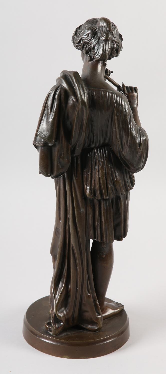 A 19TH CENTURY BRONZE FIGURE OF A CLASSICAL FEMALE, standing, playing a flute, on circular plinth, - Image 3 of 3