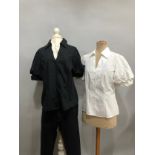 A pair of FDJ jeans, black with beading, size 14, new with tags; a puff sleeve white blouse by