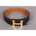 Hermès H Buckle reversible Constance leather belt, black/ mid brown, unused and boxed, gold metal