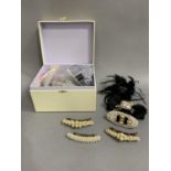 Diamanté hair ornaments contained in a cream box (qty)