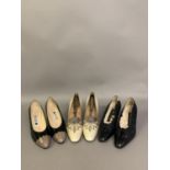 A pair of black and taupe courts by Regine, the heel and toe panel in ostrich skin effect, marked as