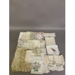 A selection of 19th and 20th century embroidered linens, lace, crochet, filet (some figurative), and