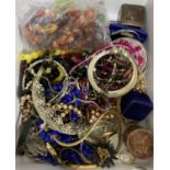 A small collection of costume jewellery and ladies wrist watches, necklaces, bracelets, bangles