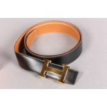 Hermès H Buckle reversible Constance leather belt, black/tan, unused and boxed, gold metal buckle