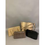 Four vintage skin handbags, the first in black by Fassbender, Made in England, with tan suede