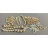 A collection of simulated pearl necklaces