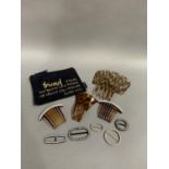 A vintage, broad, Spanish hair comb, tortoiseshell, with decorative pierced design; together with
