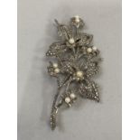 A silver, marcasite and seed pearl spray brooch c.1964, Hallmarked London, together with a silver