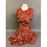 A 1970’s pattered red full-length skirt and bodice top, front buttons, fitted waist approx. 66 cm;