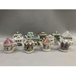 Twelve Sadler commemorative top teapots