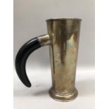 A mid 20th century tankard with buffalo horn handle, tapered straight sides over a stepped