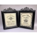 A pair of black and cream pseudo advertising boards for Chateau Yquem and Chateau Palmer with