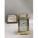 Lacquered brass carriage clock by Taylor & Bligh London, enamel dial with Roman numerals,with key,