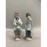 Two Lladro clowns measuring 22 and 22.5cm