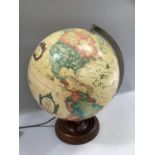 A reproduction globe on wooden base