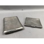 Two George V silver cigarette cases, total approximate weight 8.5oz