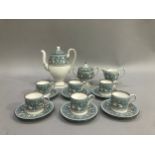 A Wedgwood Florentine coffee service comprising coffee pot, lidded two-handled sugar, cream jug, six