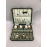 A boxed set of George V silver teaspoons each monogramed and dated 1929, hallmarked Birmingham