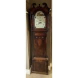 An oak and mahogany longcase clock with scroll pediment, painted windmill movement, with two weights