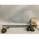 Reproduction oil burner together with a gas mask, a tailor's yard stick and another