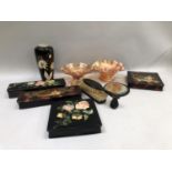 Four lacquered boxes decorated with floral and romantic scenes to the covers, two square for